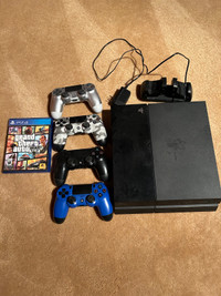 PS4, 4 controllers, controller charging port, and PS4 GTA 5 