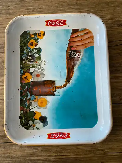 Offered is a nice French advertising Coca Cola tray. It is from 1961. Shows some wear, surface scrat...