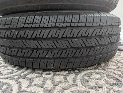 These OEM Jeep wheels and tires are in good condition and ready to be mounted. These tires have plen...