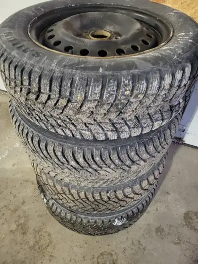 215 60R16 studded winter tires with 5x114.3 stud pattern steel rims with 61mm bore.