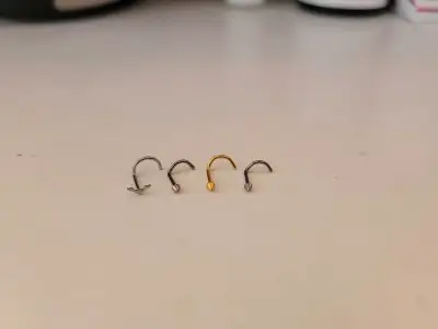 I'm selling a set of 20g stainless steel nose studs, perfect for adding a subtle sparkle to your loo...