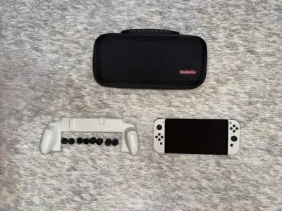Nintendo Switch OLED Bundle (Console,Pro Controller, Grip, Case), View more