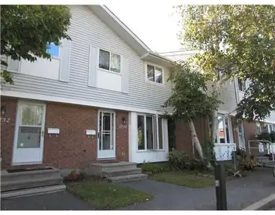 SHOWINGS WILL BE SAT AUGUST 2ND BY APPOINTMENT ONLY. 3 good sized bedrooms, 1.5 bath townhome on a p...