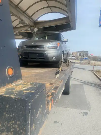 Towing courtois rapide très efficace ouvert 7 jours 514 264-3885 appel texto accepté