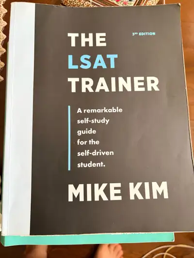 LSAT Trainer by Mike Kim. Amazing LSAT review book, some notes in pages but still usable. Price: $55...