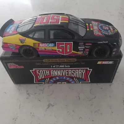 8.5 inch metal Ford Taurus with box 1 of 27,000.Racing Champions brand Located in linwood 1948-1998...