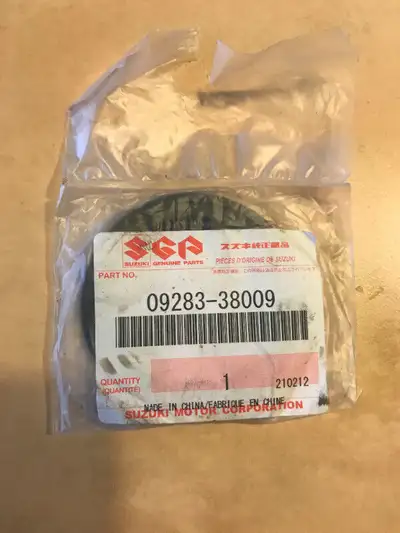 BRAND NEW Drive gear motorcycle parts. One Suzuki Oil Seal 09283-38009 (#12 on the diagram) $15. One...