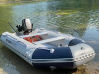 Inflatable boat and motor