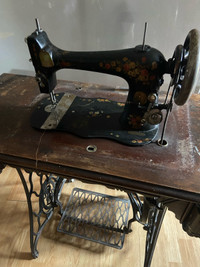 Antique sewing machine ,with a rarely found cover 