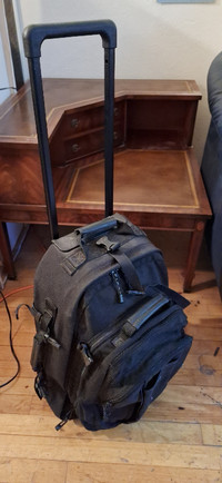 Heavy duty luggage backpack
