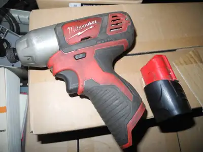 Milwake 1 2volt Impact driver with battry, View more