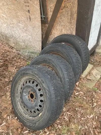 Set of 4 TOYO winter tires on rims. One wheel is 2 years old (both rim and tire) Three wheels are 5...