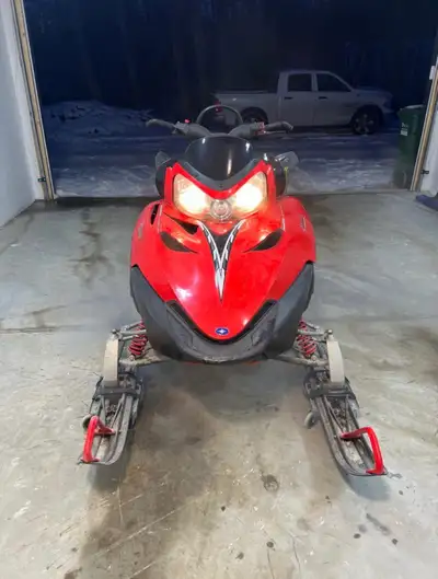 2006 Polaris RMK 700 with a 159 track, reverse, hand/throttle warmers, top to bottom engine overhaul...