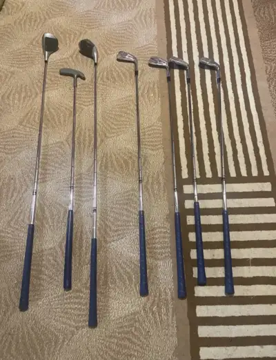 Set of right handed golf clubs, View more
