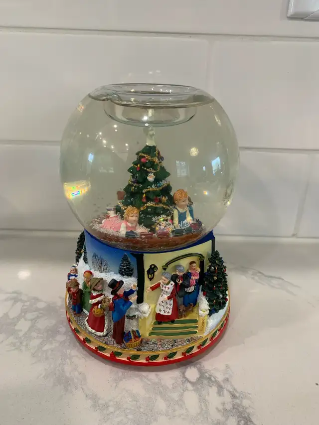 Party Lite - Christmas Mirning snow globe - $40.00