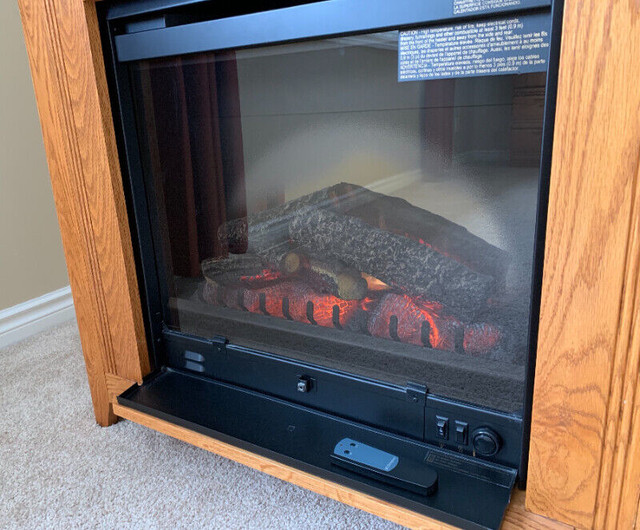 Buhler solid oak TV stand Dimplex with remote electric fireplace in Fireplace & Firewood in City of Toronto - Image 2