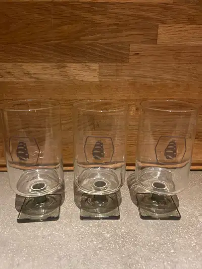 I'm selling a set of three 1970’s Molson beer glasses with smoked gray base , These glasses are in g...
