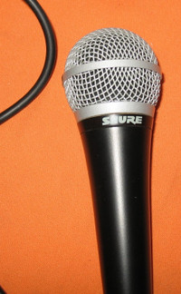 SHURE  PG58 Microphone  Slightly Used - $90.