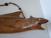 Prehistoric wooden fish sculpture 1