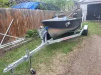 18 foot lund with new trailer and 15 HP - 4 stroke mercury
