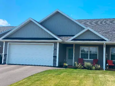 This immaculate Semi duplex home with attached heated double garage has been finished to high specif...