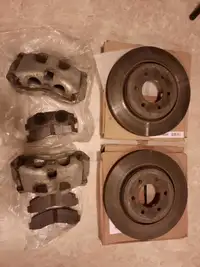 Front and rear brake calipers and rotors, F150. $250