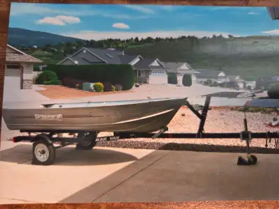 13 1/2 Foot Princecraft Aluminum Boat with Trailer 9.9 HP short shaft outboard motor, 1/4 HP electri...
