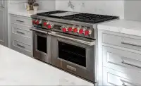 Wolf 48" gas range, Dual Fuel, stainless , great condition.Gas