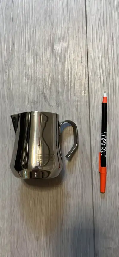 DeLonghi stainless steel milk frothing cup, View more
