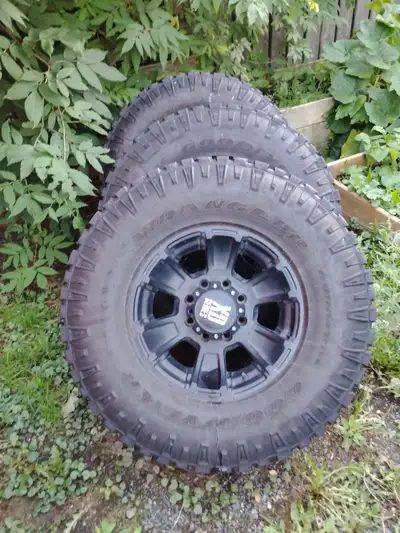 35” good year wrangler tires on all black XD rims Used for 2 summers these were on a dodge Ram 8 bol...