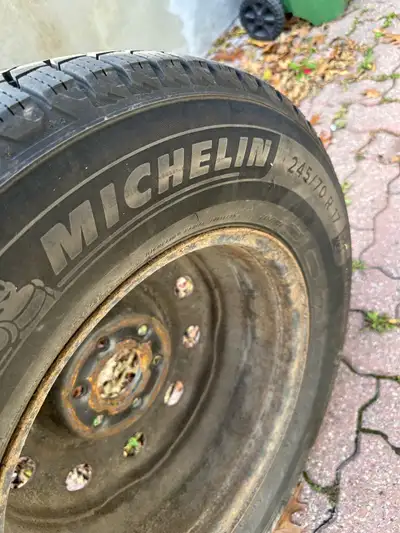Winter tires with rims, originally from a 2011 Chevrolet Traverse, these tires only saw a few short...