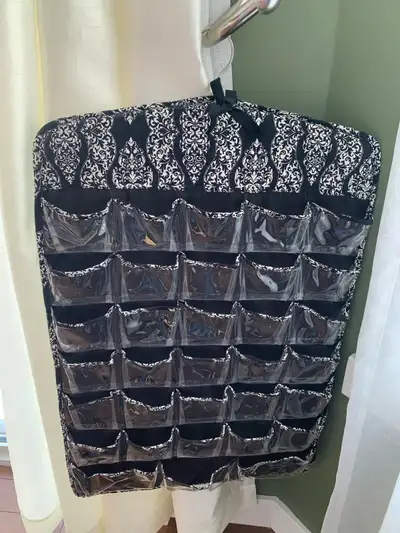Hangs behind door or in closet, like new