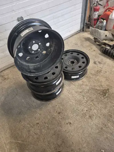 17 inch rims. Nice shape. No dings. 17x7 5x110 stud pattern. $150 obo. Trades?