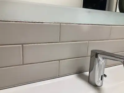 A full box 40 tiles 2.5" by 10" FlT Matte light grey tiles from Trendy tiles company. It's suitable...