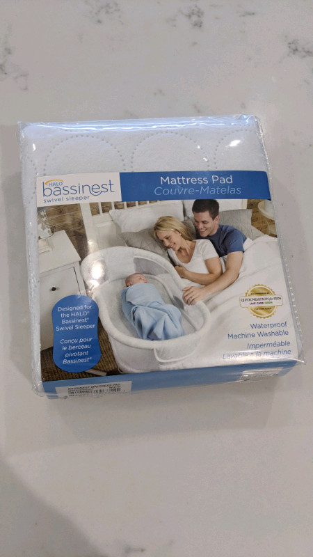 Bassinest mattress pad - new in Cribs in Windsor Region