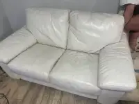 2 white leather couches