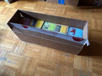 Selling boxes of over 4,000 Pokemon cards, all pack fresh in NM-M conditions. I have five neatly-org...