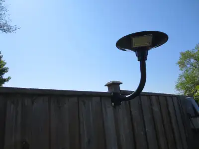 Brand new, solar garden light Dusk to dawn auto ON/OFF. With remote make it low mode or full. Three...