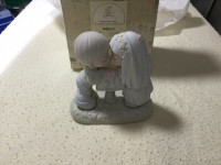 Precious Moments Sealed with a Kiss figurine