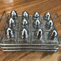 Salt and Pepper shakers with metal stand.