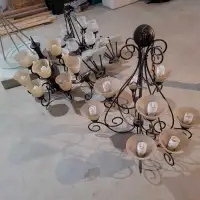 A lot of light fixtures, chandeliers
