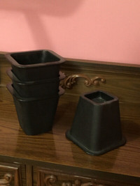 Set of 4 furniture risers.