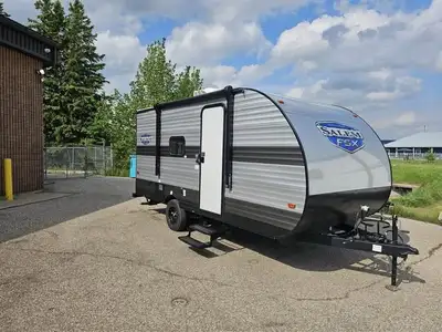 Full bathroom with shower; cozy fireplace (never used); functional stove and fridge; sink; comfortab...
