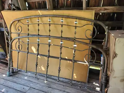 Antique, king size Bed Frame in beautiful condition, needs a good polish and she will gleam! Call 25...