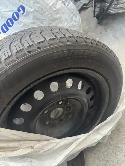 Faily New four winter tires for sale. Come with rims. Message if interested