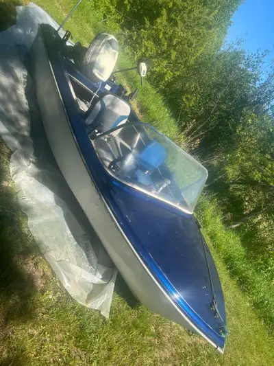 14’ fibreglass fishing boat with a 40HP johnson motor. Motor starts easily and runs great. Ready for...