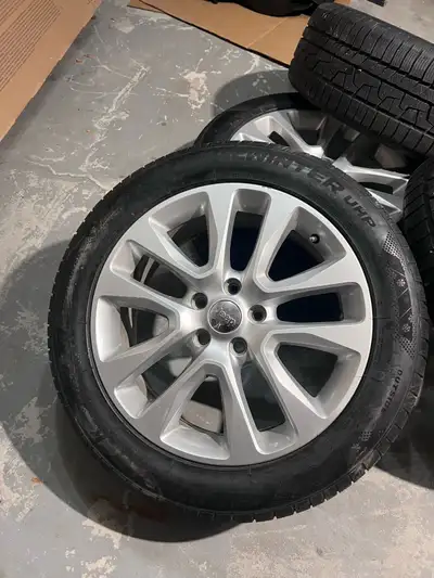 ⸻ Selling 4 sets of winter tires on Jeep rims, all in good shape. About 80% tread left. Bolt pattern...
