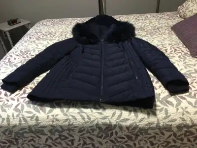 Woman’s winter coat size large,name brand is Ricki s, View more