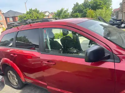 dodge Journey for sale red has some rust marks on body negotiable price $1000