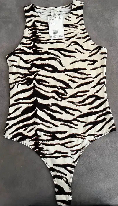 Animal print (zebra) Size S New H&M Bodysuit with tags (never wore) 87% recycled polyester 13% recyc...